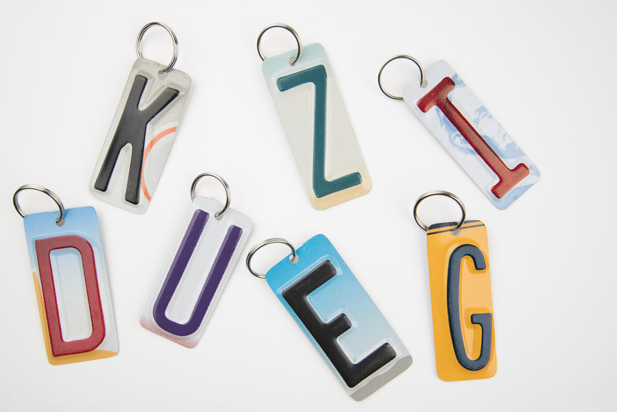 SET OF 7 KEY CHAINS - Unique Pl8z