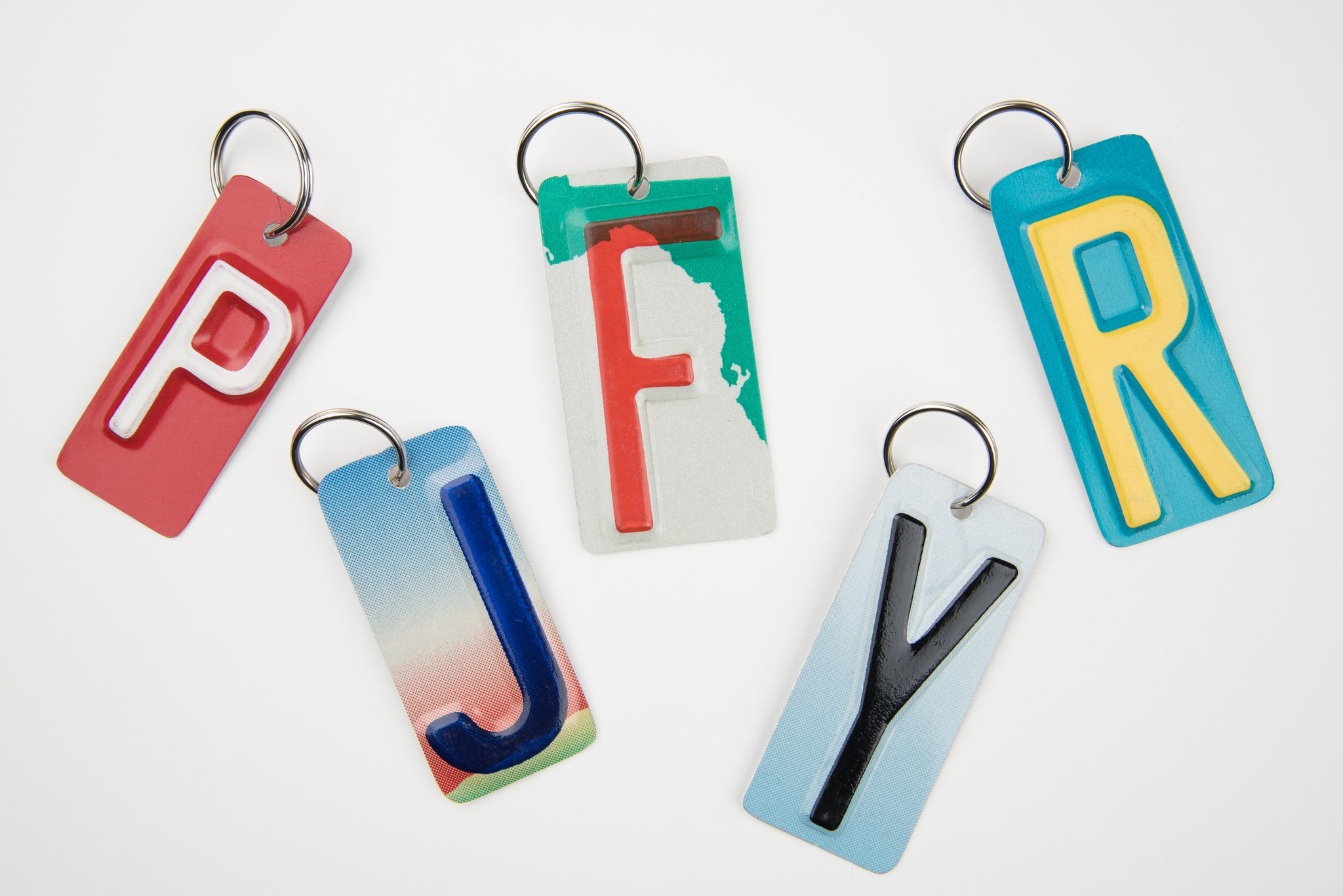 SET OF 5 KEY CHAINS - Unique Pl8z